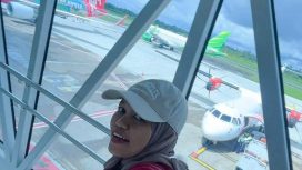 Foto Siti Mustiani saat akan melakukan perjalanan